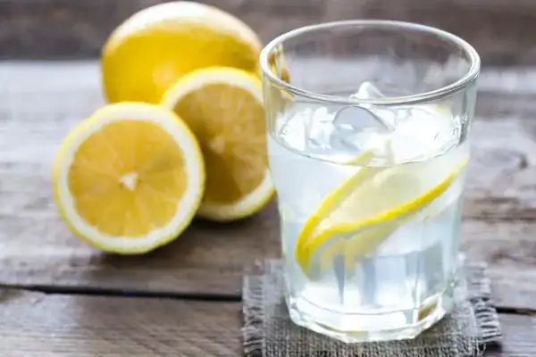 Hydration: The Secret Ingredient for a Toned Stomach and Enhanced Fitness 2 Image of lemon water to aid hydration East Malling